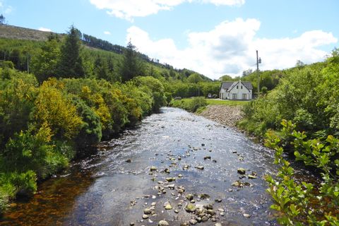 Typical cottage next to a stream in the Wicklow Mountains