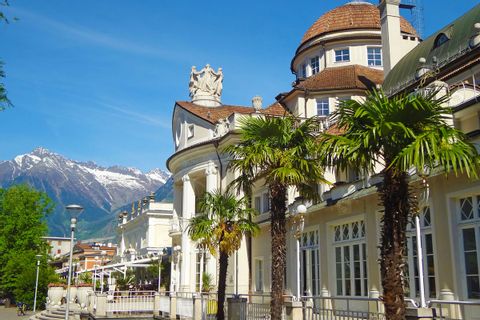 Walking path leads along the well-known Kurhaus in Merano