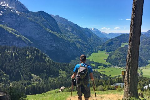 Mountain hiker along the way to Abtenau
