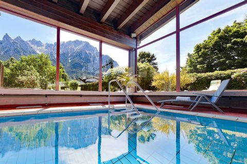 Pool with view of the Karwendel Mountains at Hotel Post